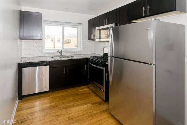 7549 N Bell Ave-Unit -Unit 2C in Chicago, IL - Building Photo - Building Photo