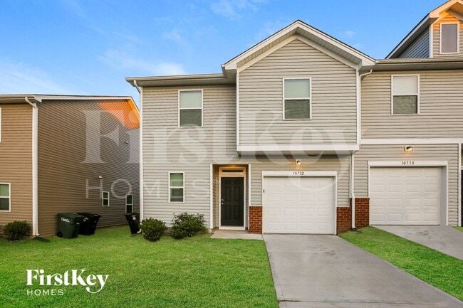 property at 10732 Rivergate Dr NW