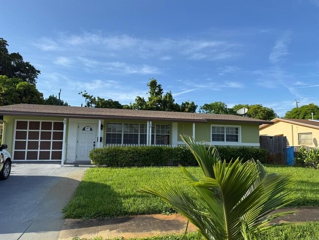 property at 5839 NW 16th St