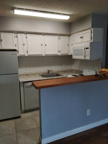 9809 Walnut St, Unit E305 in Dallas, TX - Building Photo - Building Photo