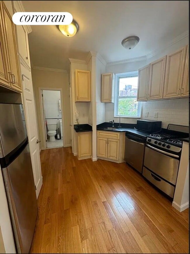 property at 235 E 27th St