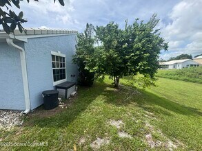 1996 Sugarberry Ct NE in Palm Bay, FL - Building Photo - Building Photo