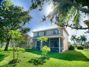 5152 Woodfield Way in Coconut Creek, FL - Building Photo - Building Photo