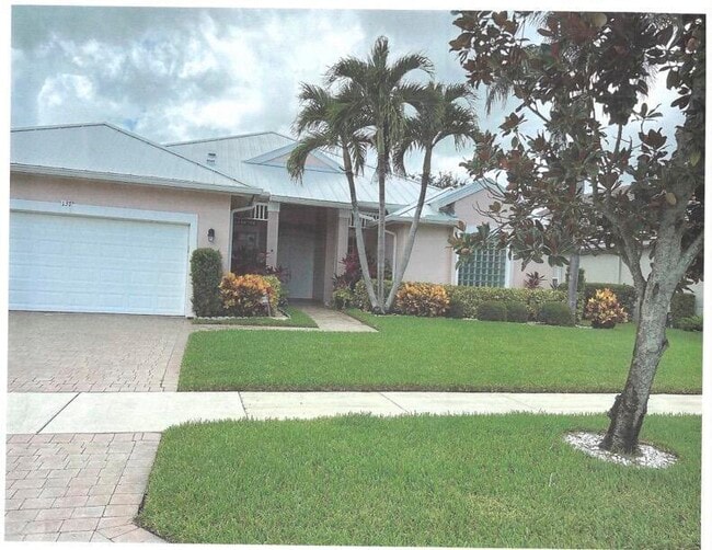 property at 137 NW Magnolia Lakes Blvd