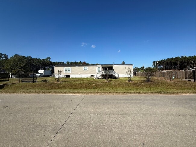 239 Road 5027 Rd in Cleveland, TX - Building Photo - Building Photo