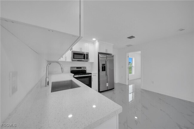 3819 3rd St W in Lehigh Acres, FL - Building Photo - Building Photo