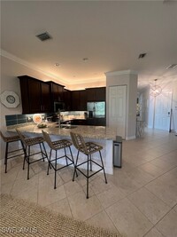 12016 Five Waters Cir in Ft. Myers, FL - Foto de edificio - Building Photo