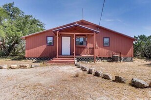 7445 McGregor Ln, Unit 1 in Dripping Springs, TX - Building Photo