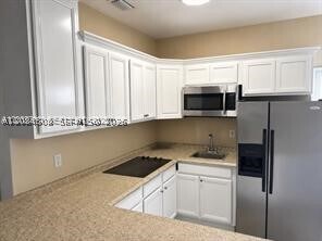 property at 591 SE 1st St