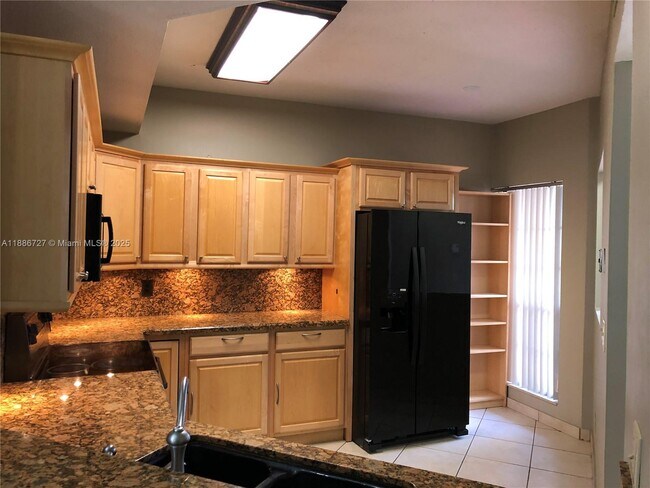 15875 SW 3rd Ct, Unit 101 in Pembroke Pines, FL - Building Photo - Building Photo
