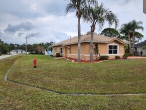 6031 NW Flair Ct in Port St. Lucie, FL - Building Photo - Building Photo