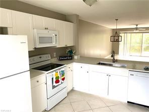 3071 Sandpiper Bay Cir-Unit -L102 in Naples, FL - Building Photo - Building Photo