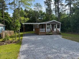 10731 Lilinoe Way in Diamondhead, MS - Building Photo