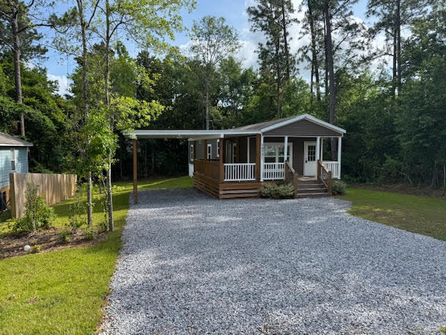 10731 Lilinoe Way in Diamondhead, MS - Foto de edificio