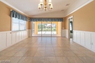 7640 Rozzini Ln in Naples, FL - Building Photo - Building Photo