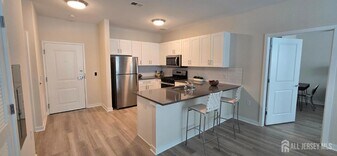 211 Henderson Rd, Unit 1302 in Monmouth Junction, NJ - Building Photo