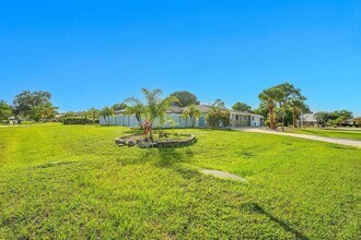 154 SE Naranja Ave in Port St. Lucie, FL - Building Photo - Building Photo