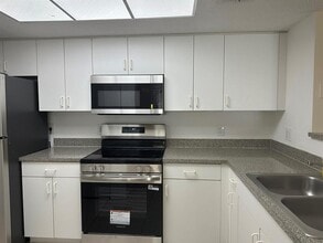 5001 Wiles Rd in Coconut Creek, FL - Building Photo - Building Photo