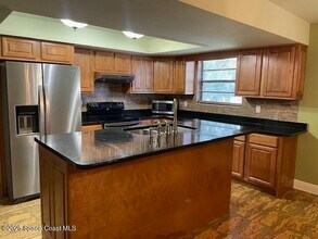 4050 Barr Ln in Titusville, FL - Building Photo - Building Photo