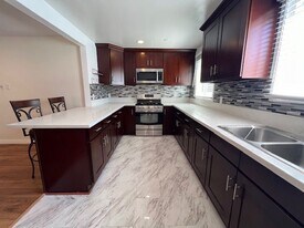 9711 Hayvenhurst Ave in Los Angeles, CA - Building Photo