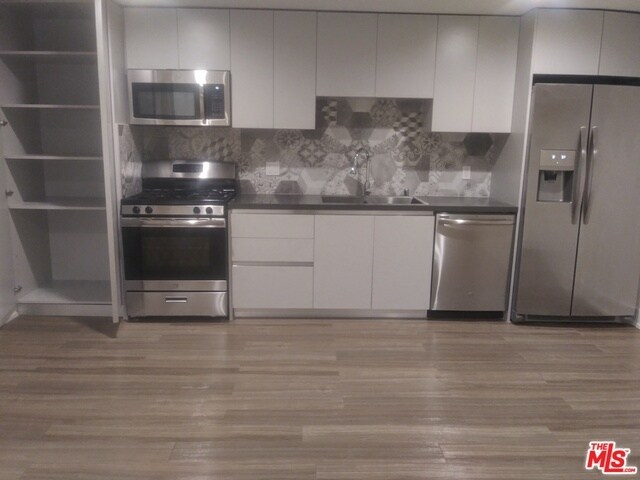 11847 Kiowa Ave-Unit -107 in Los Angeles, CA - Foto de edificio - Building Photo