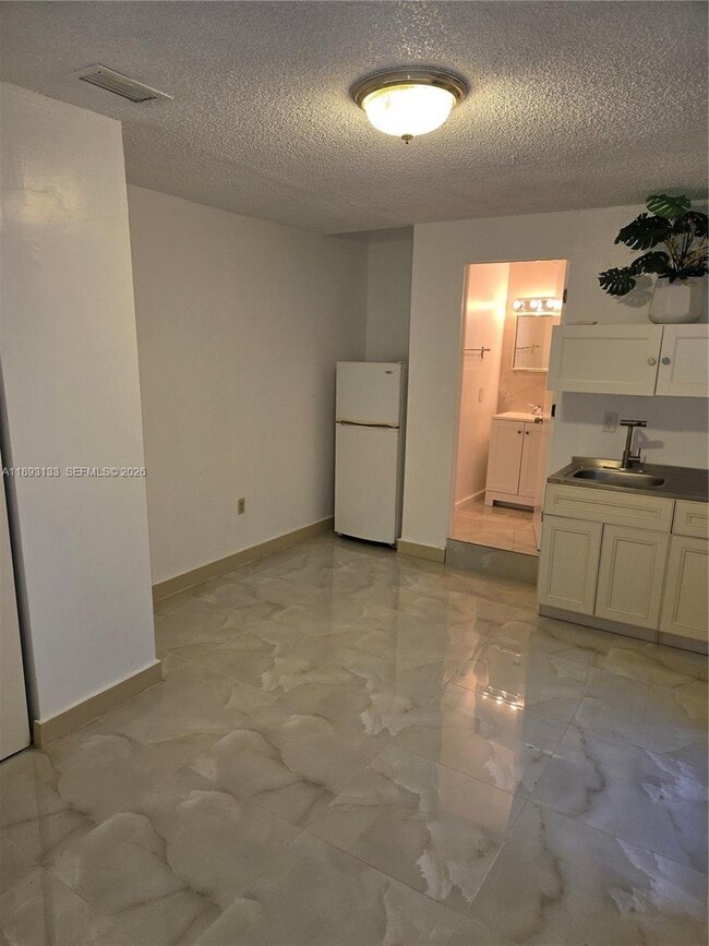 property at 4716 SW 1st St