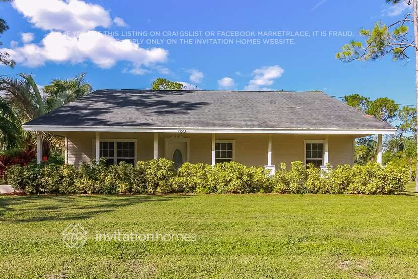 15553 67th Ct N in The Acreage, FL - Building Photo