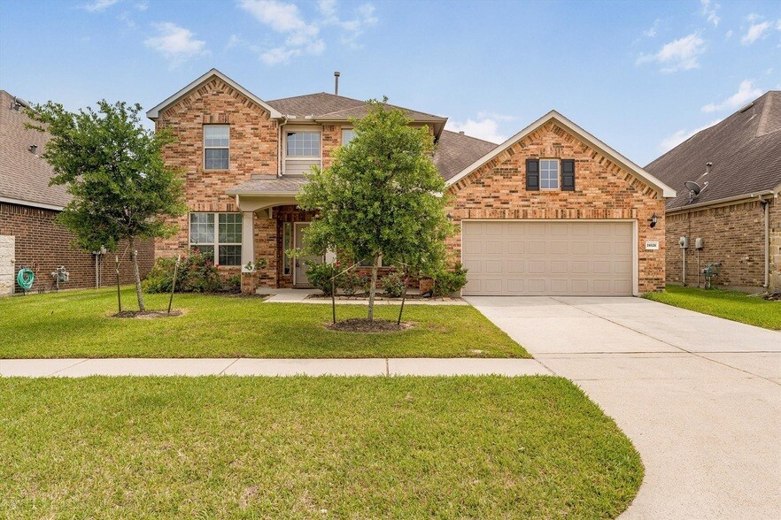 24526 Raven Cliff Falls Dr in Tomball, TX - Building Photo