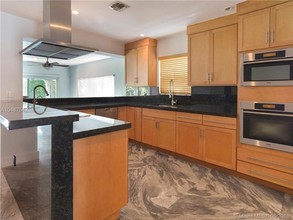 1240 Stillwater Dr in Miami, FL - Building Photo - Building Photo