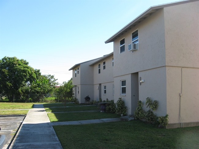 Marshall Heights Apartments in South Bay, FL - Building Photo - Building Photo