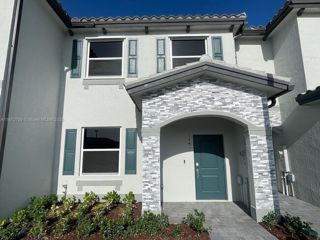 property at 144 SE 10th St
