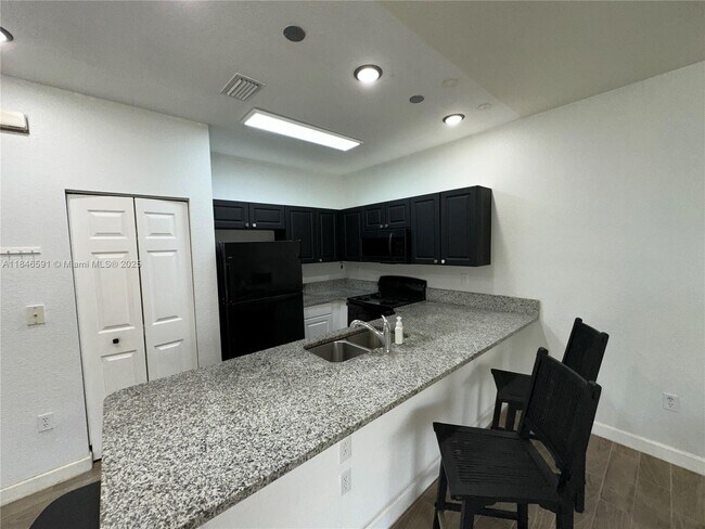 property at 4908 SW 141st Ave