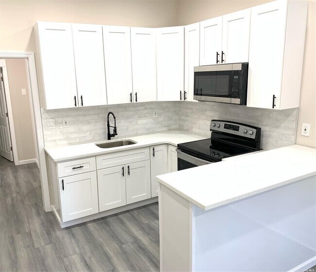 property at 61-38 164th St