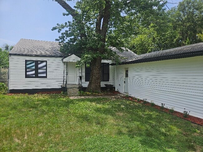 property at 6940 E 5th St