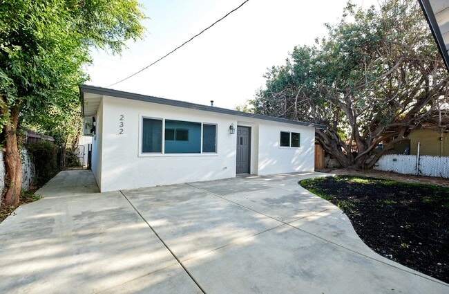 property at 232 W 3rd St