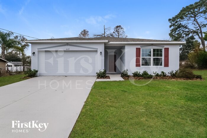 6177 Kinlock Ave in Spring Hill, FL - Building Photo