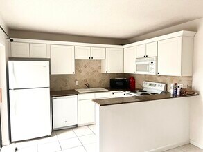 1620 16th Ln in Palm Beach Gardens, FL - Building Photo - Building Photo