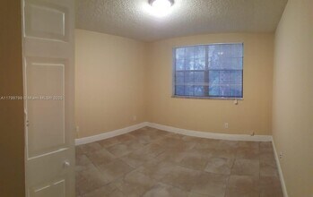 11211 W Atlantic Blvd in Coral Springs, FL - Building Photo - Building Photo