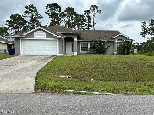 property at 717 Foxtail St E