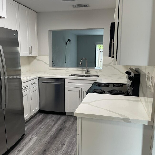 property at 301 Palm Cir E