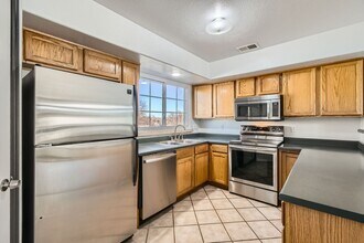 8199 Welby Rd in Denver, CO - Foto de edificio - Building Photo