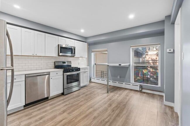 property at 509 W 23 St
