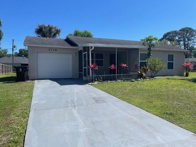 1719 SW Import Dr in Port St. Lucie, FL - Building Photo