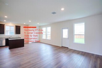 384 Papaya Dr in Mustang Ridge, TX - Building Photo - Building Photo