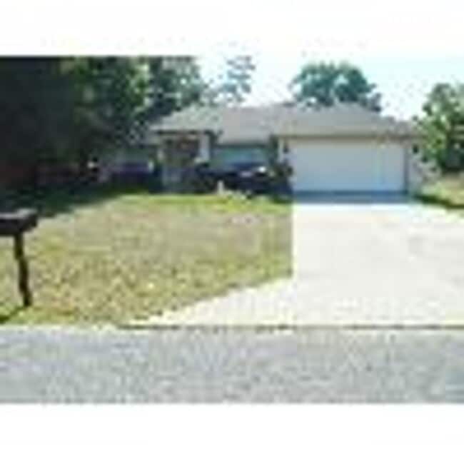 property at 10311 SW 54th Ct