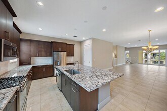 7112 Edison Pl in Palm Beach Gardens, FL - Building Photo - Building Photo