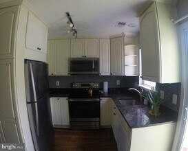 8702 Village Green Ct in Alexandria, VA - Building Photo - Building Photo