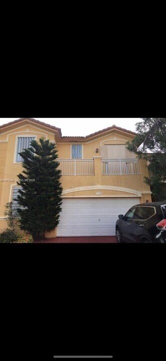 7586 NW 113th Path in Medley, FL - Building Photo