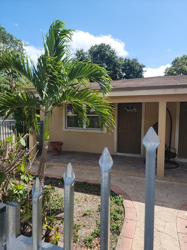 property at 102 NW 64th St