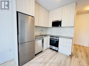 7437 Kingston Rd in Toronto, ON - Building Photo - Building Photo